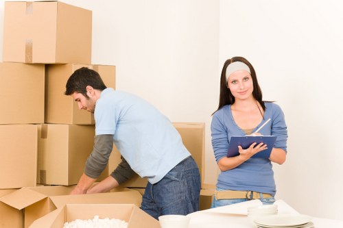 Professional office relocation team handling equipment